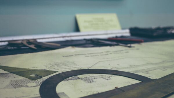 beam design-printed paper on desk